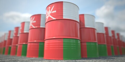 Flag of Oman on the barrels or steel drums. Chemical or oil industry related 3D rendering