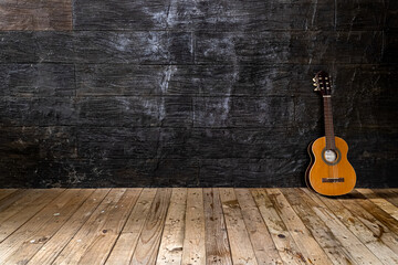 Acoustic guitar in a rustic wooden setting  - obrazy, fototapety, plakaty