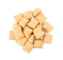 Pile of tasty corn pads on white background, top view. Healthy breakfast cereal
