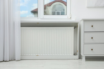 Modern radiator at home. Central heating system - obrazy, fototapety, plakaty