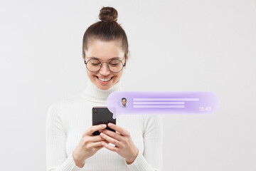 Cheerful woman in round glasses chatting with her boyfriend in popular messenger
