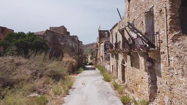 Aerial drone view of the ruins of Poggioreale on the Belice valley, in the province of Trapani. The town was destroyed by and earthquake in 1968. Abandoned empty eerie ghost town in Sicily.