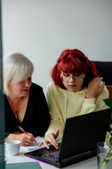 Mother with daughter preparing for the university entrance exam in Europe