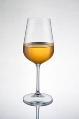 Glass filled with white wine