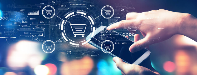 Online shopping theme with blurred city lights at night