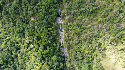 Fototapeta premium waterfalls flowing down a large mountain in colombia