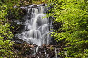 Waterfall in The Lodge Forest Visitor Centre. Scotland, UK. The gateway to Queen Elizabeth Forest Park. Forests and land that Scotland. Panoramic views and scenic trails. Place to watch wildlife 