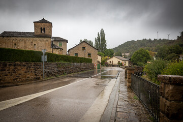 Fototapeta na wymiar a street in Santa Cruz de la Serós (Santa Cruz d'as Serors) including the hermitage of San Caprasio, province of Huesca, Aragon, Spain