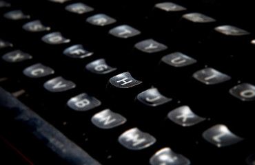 1970s dusty typewriter key H