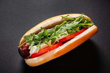 hot dog on the black background