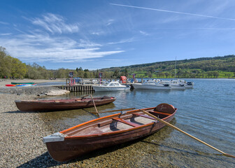 Coniston, United Kingdom - 21st April 2022 : A view of rowing boats at Coniston Water