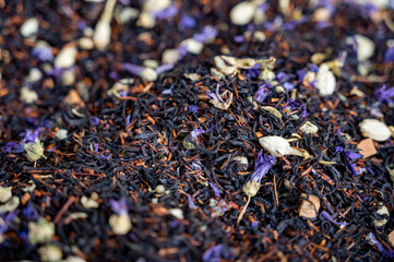Blended black leaf dry tea with aromatic flowers, spices in tea shop in Andalusia, Spain