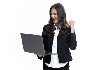 Portrait of young businesswoman using laptop computer isolated on gray background. Business women...