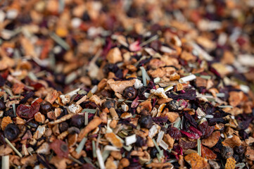 Blended black leaf dry tea with aromatic flowers, spices in tea shop in Andalusia, Spain