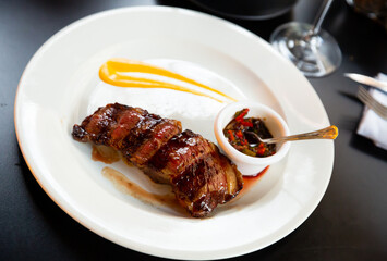 Traditional Argentine rump steak - roasted tail of rump from Angus beef with vegetable sauce..