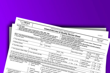 Form 13614-C documentation published IRS USA 44207. American tax document on colored