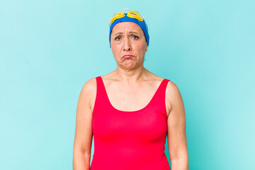 middle age woman feeling sad and whiney with an unhappy look and crying. swimming concept