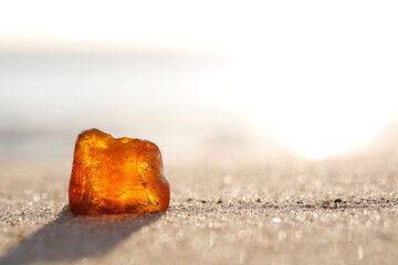 Amber washed ashore on a sandy beach