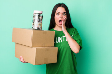 young adult woman feeling shocked and scared. donation concept