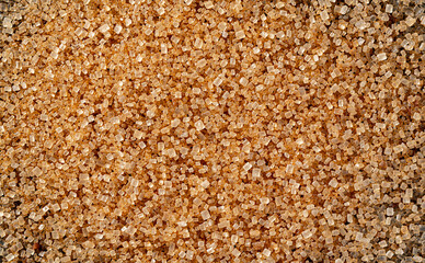 Raw Unrefined Brown Sugar in the Raw Form Top View Flat Lay Macro Texture Background