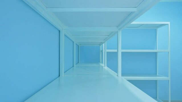 4K Video of empty white shelves in blue storage room