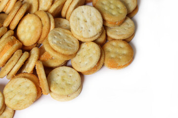 Fototapeta na wymiar Pile of Cheese Snack Crackers Close up