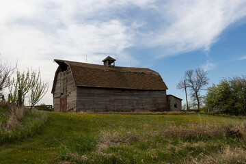 old falling down abandon barn in field