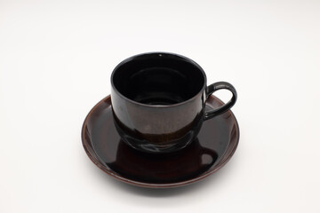 Black coffee cup and saucer set,Include Clipping Path.