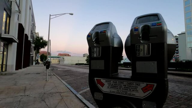 PArking meter on a street early morning 
