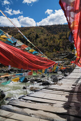 Wooden bridges, prayer flags and tourist attractions in the Tibet Autonomous Region of China, on January 1st, 2015