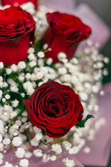 red roses and white flowers