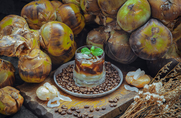Sliced fresh toddy palm in fresh toddy palm juice with crushed ice mixed Espresso coffee and mint...