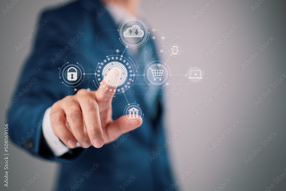 Poster On a virtual screen, a businessman tapping his fingerprint scan gives a secure payment, banking, and cloud computing network connection interface.