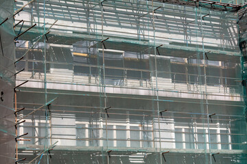 Scaffolding at the wall of the building.