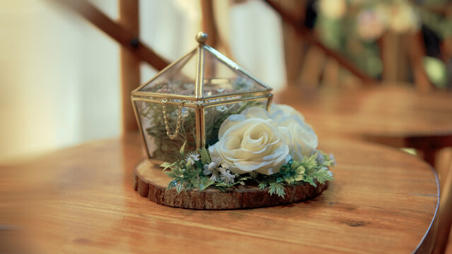 bouquet of roses and rings on the table