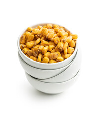 Roasted salted corn snack in bowl isolated on white background.