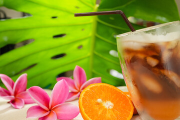 Glass Orange Juice And Lychee Juice On Sand Background. Summer Refreshing Drinks. 