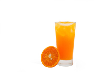 glass of orange juice and oranges