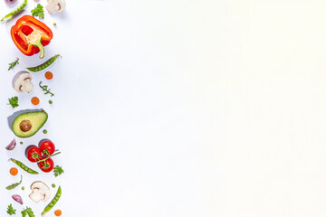 Various fresh vegetables pattern. Raw organic vegetables, salad ingredients bright flatlay on white background. Healthy diet common diet, vegan vegetarian food cooking background copy space