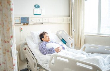 patient sleeping in hospital bed