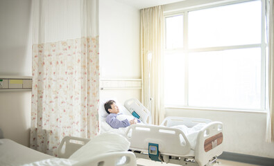 patient sleeping in hospital bed