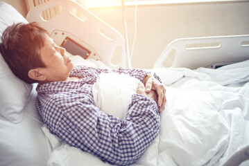 patient sleeping in hospital bed