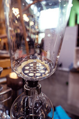 Siphon Coffee Experience Brewing Glass. Vacuum pot background.
