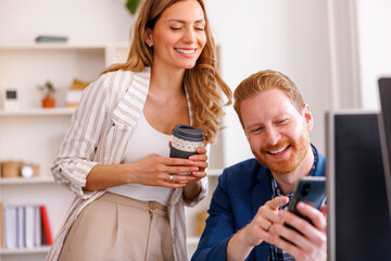 Colleagues working together in an office