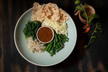 Pecel or Indonesian Peanut Sauce for Salad is one of the Indonesian-style peanut sauce usually served with vegetables. The distinctive aroma of pecel comes from a kencur (Kaempferia galanga).