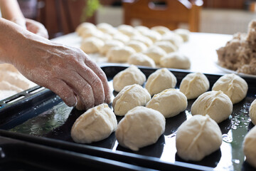  Woman cooking pies at home. Cooking and baking at home.