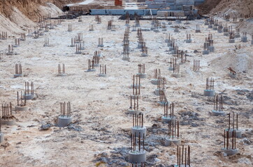 Construction of the building. Construction of an apartment house. Concrete slab foundation building. The foundation of reinforced concrete multistory apartment building.