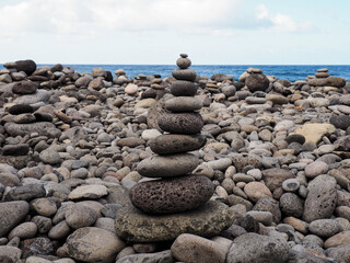 beautiful stone formation in front of the blue ocean 