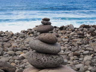 beautiful stone formation in front of the blue ocean 