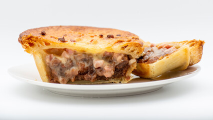 Fresh baked golden flaky chunky cheese and bacon flavoured pie